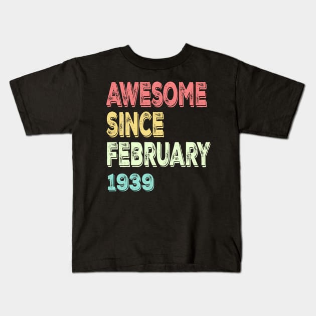 Awesome since February 1939 Kids T-Shirt by susanlguinn